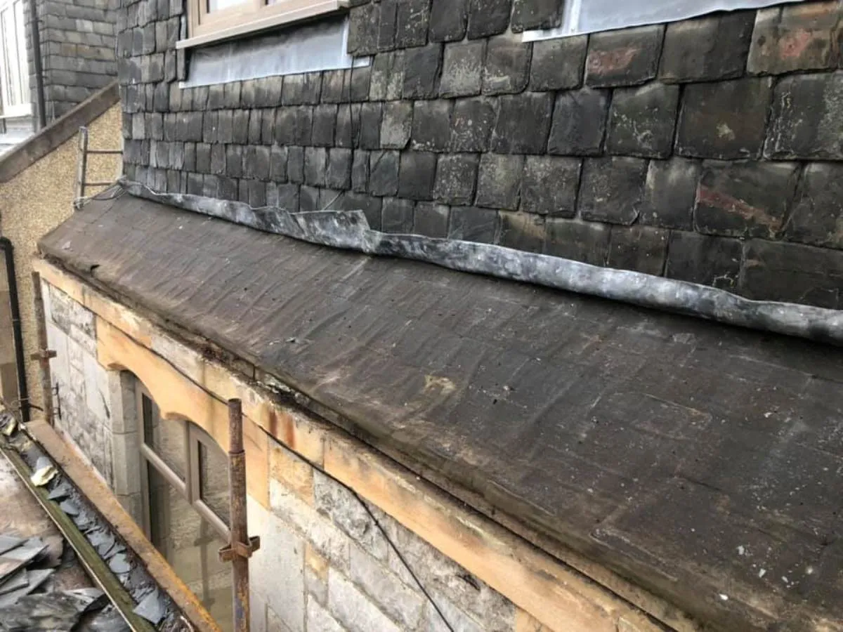 Flat roof alongside slate roof on a property in the Forth Valley