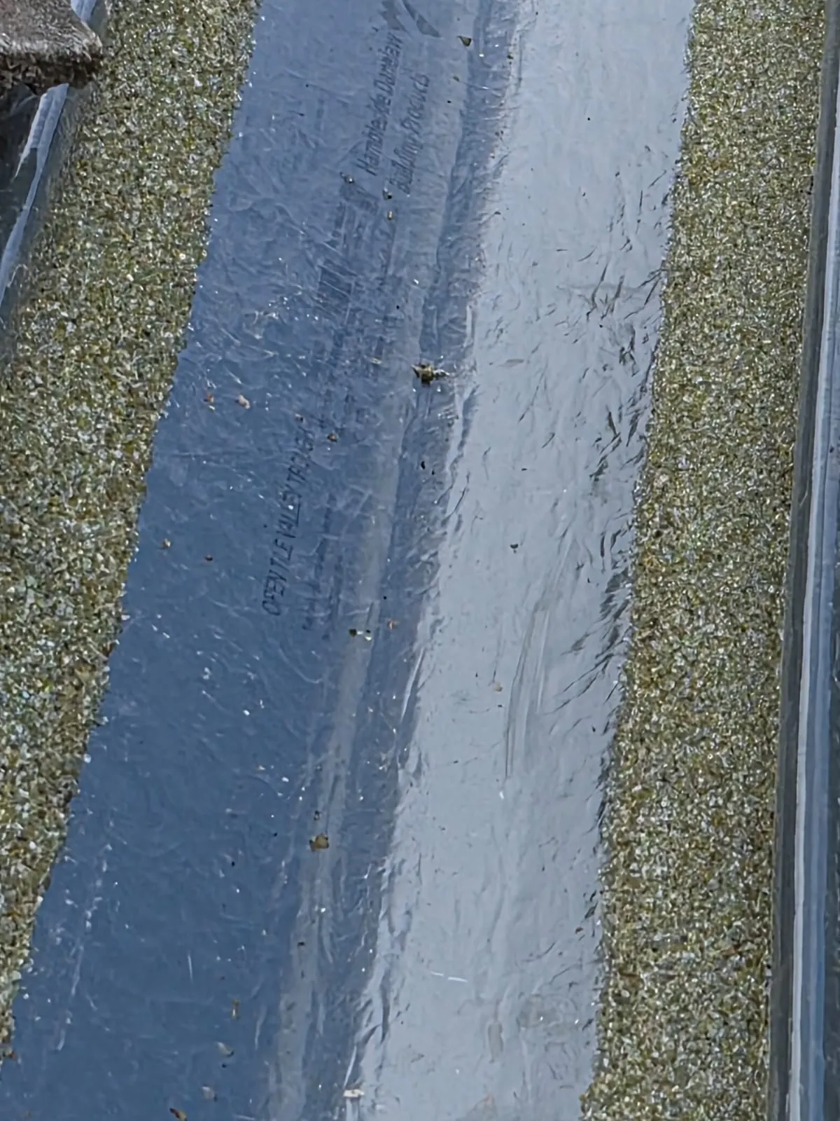 Completed lead valley flashing neatly dressed between tiled roof slopes in Alloa