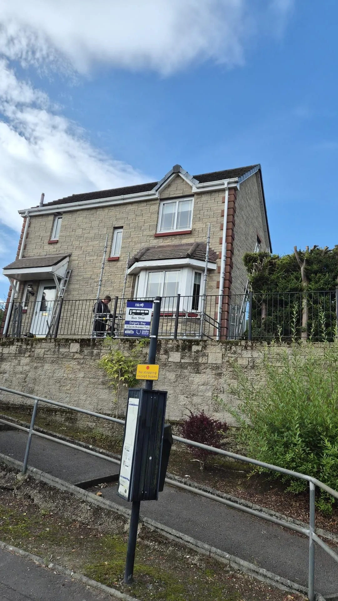 Detached house in Dalgety Bay with its original weathered concrete tile roof before replacement