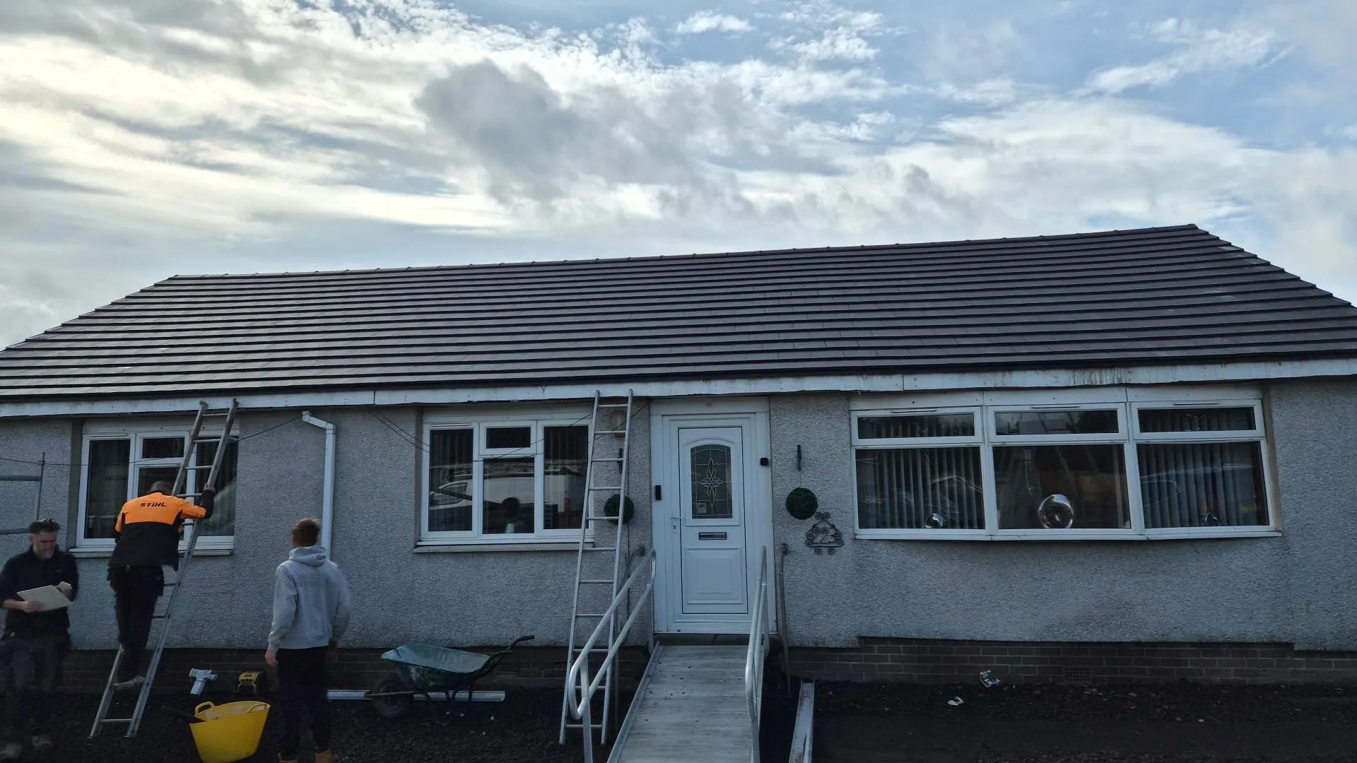 HS Roofing team on the completed new roof in Lochgelly, July 2026
