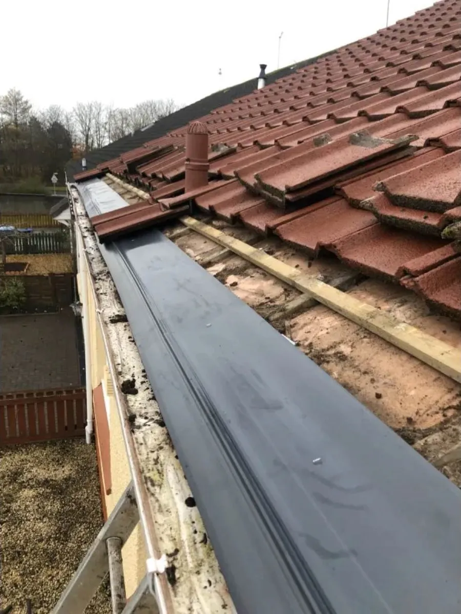 Lead lined gutter with tile roof in Clackmannanshire
